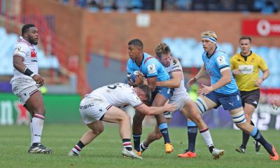 Canan Moodie of the Bulls challenged by Yanis Charcosset and Kyle Godwin of Lyon during the United Rugby Championship 2023/24 match between Bulls and Lyon at Loftus Stadium in Pretoria on 06 April 2024