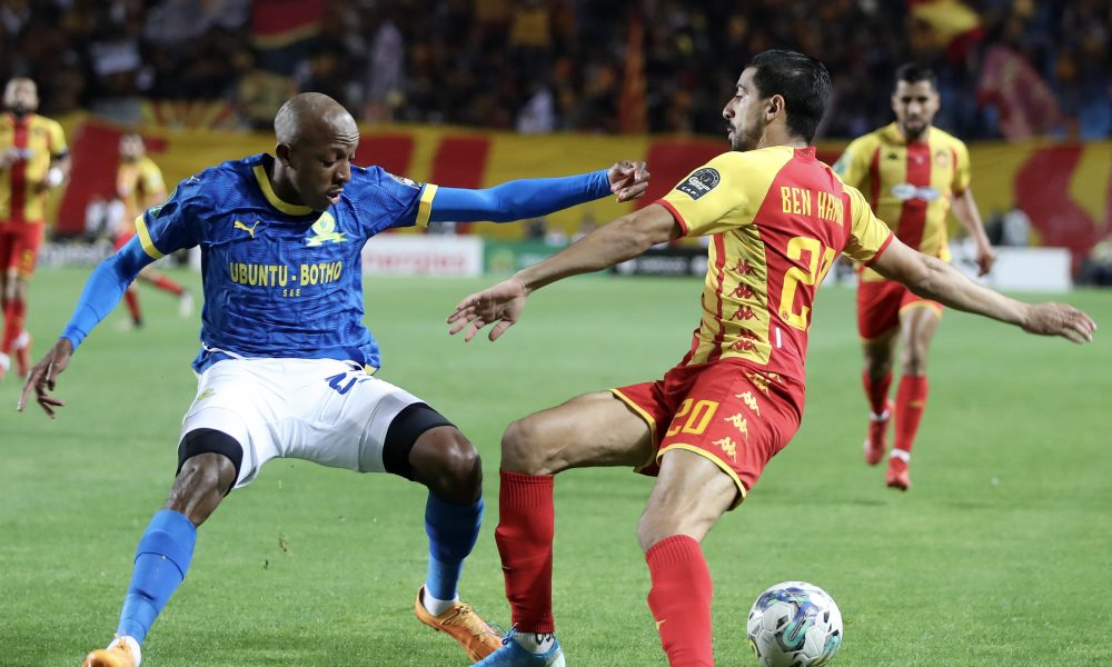Mohamed Ben Hamida of Esperance Tunis challenged by Khuliso Mudau of Mamelodi Sundowns during the CAF Champions League 2023/24 1st leg semifinal match between Esperance Tunis and Mamelodi Sundowns at Stade Olympique Hammadi Agrebi in Rades, Tunisia on 20 April 2024