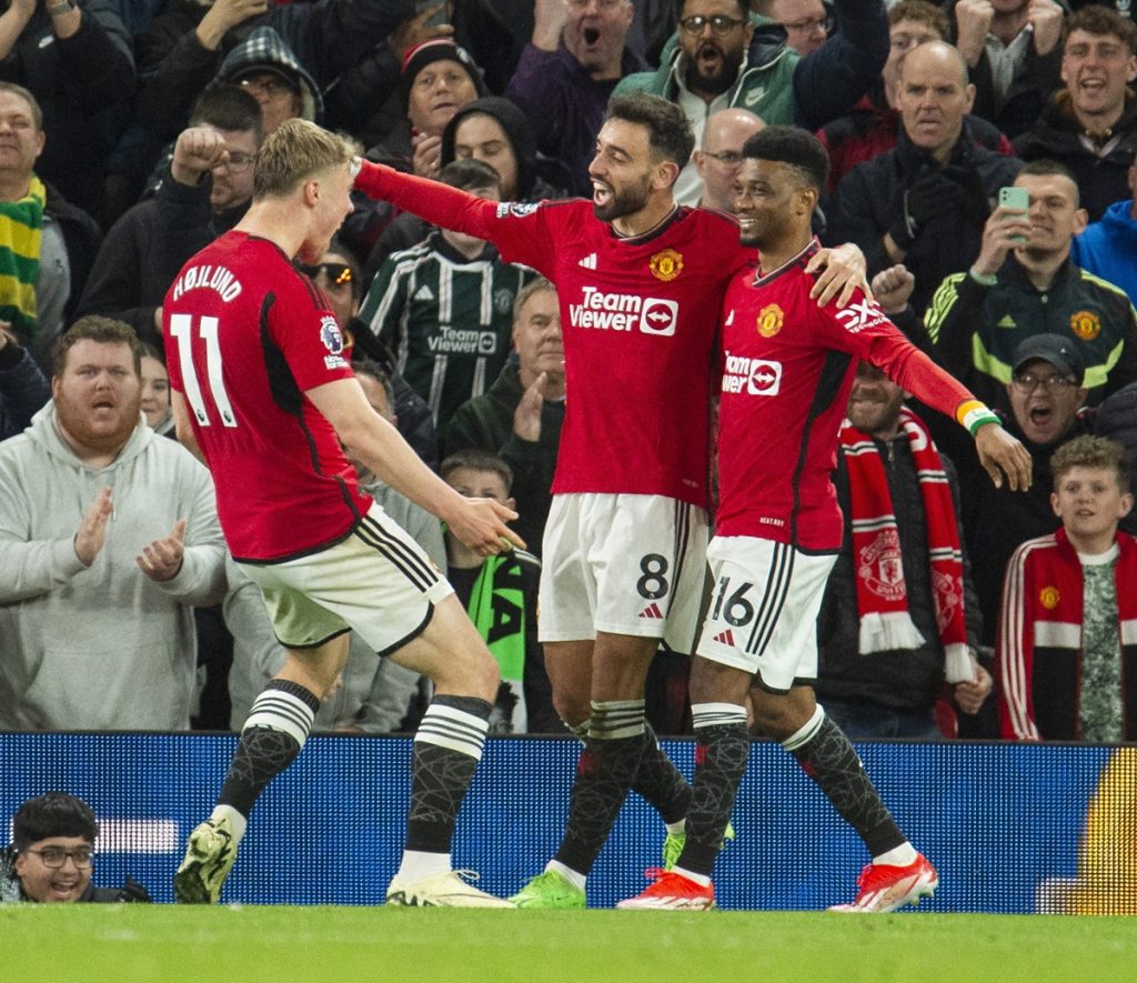 Rasmus Hojlund (L) of Manchester United celebrates with teammates after acoring the 4-2 goal during the English Premier League soccer match of Manchester United against Sheffield United, in Manchester, Britain, 24 April 2024. EPA/PETER POWELL EDITORIAL USE ONLY. No use with unauthorized audio, video, data, fixture lists, club/league logos, 'live' services or NFTs. Online in-match use limited to 120 images, no video emulation. No use in betting, games or single club/league/player publications.