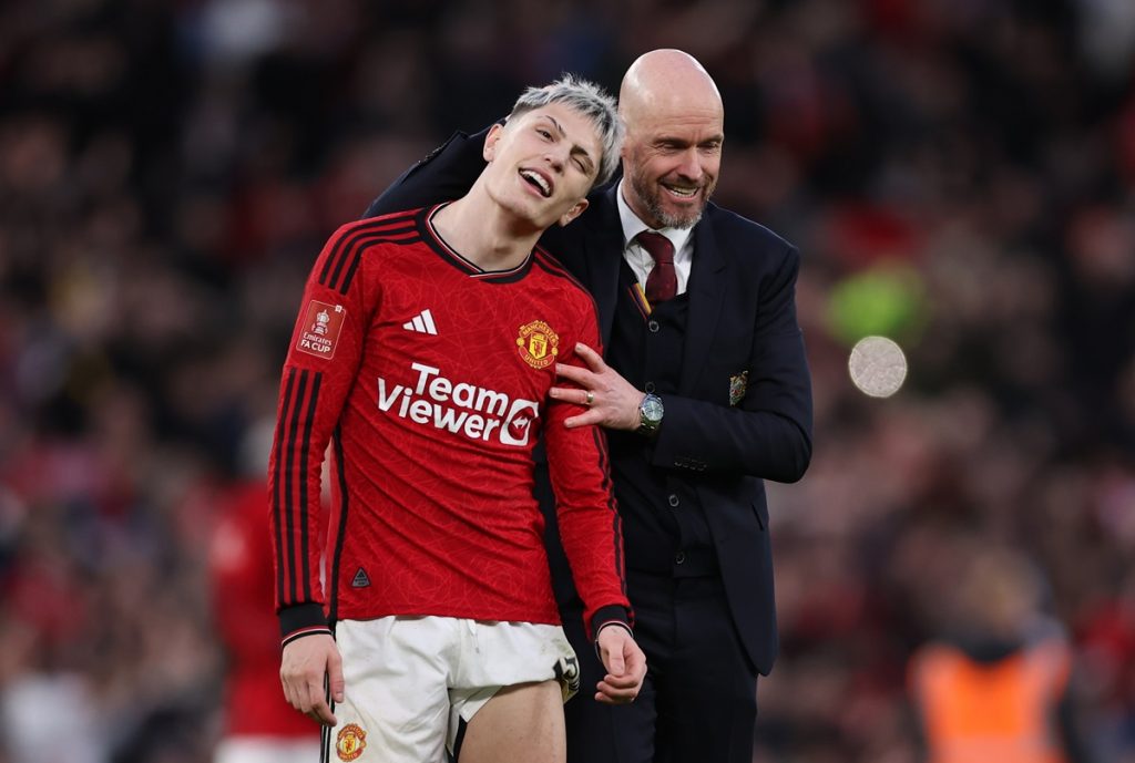Alejandro Garnacho of Manchester United (L) and Manchester United manager Erik ten Hag (R) celebrate after winning the FA Cup quarter-final soccer match between Manchester United and Liverpool.