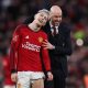 Alejandro Garnacho of Manchester United (L) and Manchester United manager Erik ten Hag (R) celebrate after winning the FA Cup quarter-final soccer match between Manchester United and Liverpool.
