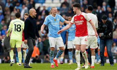 Manchester City manager Pep Guardiola and Erling Haaland speaks with Arsenal's Declan Rice and Gabriel following the Premier League match at the Etihad Stadium.