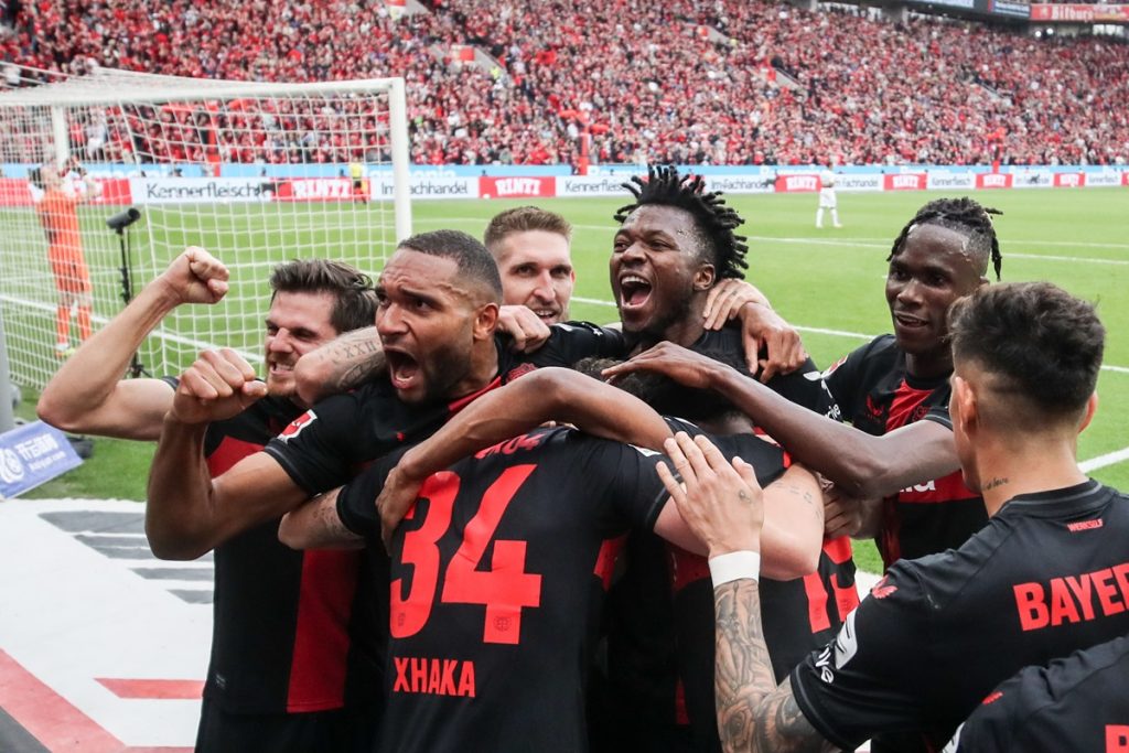Leverkusen's players celebrate the 2-0 lead during the German Bundesliga soccer match between Bayer 04 Leverkusen and SV Werder Bremen in Leverkusen.