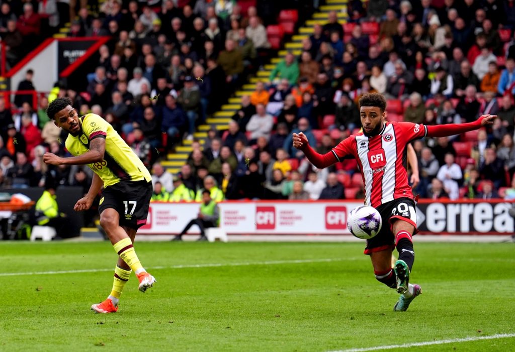 Burnley's Lyle Foster scores their side's third goal of the game during the Premier League match at Bramall Lane, Sheffield. Picture date: Saturday April 20, 2024.