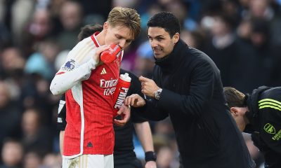 Arsenal's Martin Odegaard (L) receives instructions from Arsenal manager Mikel Arteta (R) during the English Premier League match between Manchester City and Arsenal in Manchester, Britain, 31 March 2024.