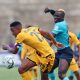 Given Msimango of Kaizer Chiefs challenged by Khuda Muyaba of Richards Bay during the DStv Premiership 2023/24 match between Richards Bay and Kaizer Chiefs at the King Zwelithini Stadium.