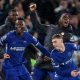 Cole Palmer of Chelsea celebrates with teammates after scoring the 3-3 goal during the English Premier League match between Chelsea and Manchester United at Stamford Bridge.