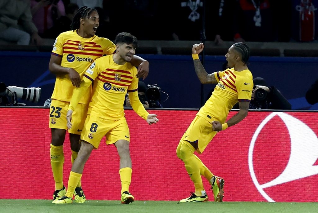 Raphinha celebrates after scoring his second goal during the UEFA Champions League quarter-finals between Paris Saint-Germain and FC Barcelona, in Paris.