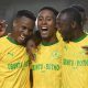 Lucas Rebeiro Costa of Mamelodi Sundowns celebrates with teammates Themba Zwane and Peter Shalulile after scoring from the penlty spot during the DStv Premiership 2023/24 football match between Cape Town Spurs and Mamelodi Sundowns at Athlone Stadium.