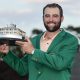 Golfer Scottie Scheffler of the US holds up his trophy after winning the Masters Tournament at the Augusta National Golf Club in Augusta.