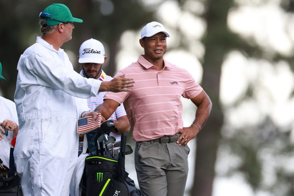 Tiger Woods of the US (R) and his caddie Lance Bennett (L) on the fourth tee box during the first round of the Masters Tournament at the Augusta National Golf Club in Augusta, Georgia, USA, 11 April 2024. The Augusta National Golf Club is holding the Masters Tournament from 11 April through 14 April 2024. EPA/JUSTIN LANE