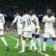Real Madrid's Vinicius Jr. (R) celebrates a goal with his teammates during the UEFA Champions League quarter finals first leg soccer match soccer match between Real Madrid and Manchester City at the Santiago Bernabeu.