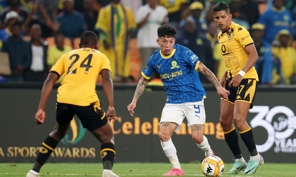 Matias Esquivel of Mamelodi Sundowns challenged by Thatayaone Ditlhokwe and Edson Castillo of Kaizer Chiefs during the DStv Premiership 2023/24 match between Kaizer Chiefs and Mamelodi Sundowns at the FNB Stadium, Johannesburg on the 02 May 2024