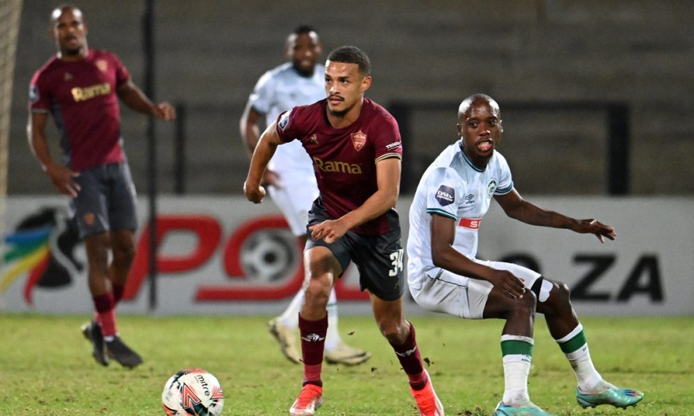 Devin Titus of Stellenbosch FC pulls away from Ben Motshwari of AmaZulu FC during the DStv Premiership 2023/24 game between Stellenbosch and AmaZulu at Danie Craven Stadium.