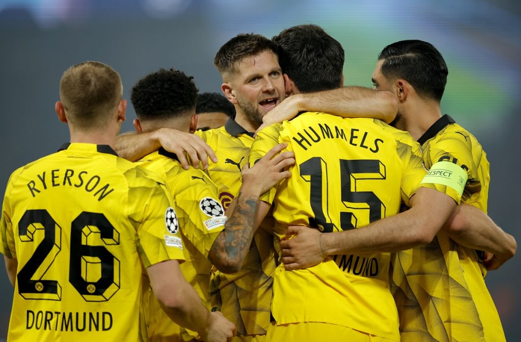 Mats Hummels (C) of Dortmund celebrates with teammates after scoring the opening goal during the UEFA Champions League semi-finals, 2nd leg soccer match of Paris Saint-Germain against Borussia Dortmund.