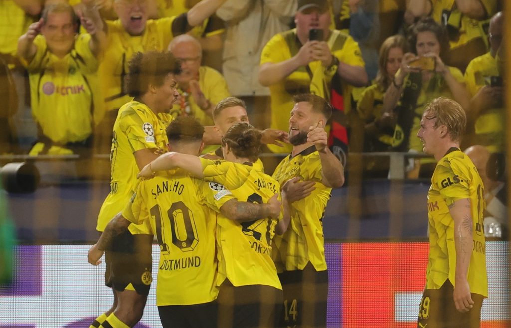 Borussia's Niclas Fullkrug (C-R) celebrate with teammates after scoring for the 1-0 lead during the UEFA Champions League semi final, 1st leg match between Borussia Dortmund and Paris Saint-Germain in Dortmund, Germany, 01 May 2024. EPA/FRIEDEMANN VOGEL