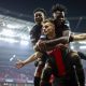 Josip Stanisic (C) of Leverkusen celebrates with teammates after scoring the 2-2 equalizer during the UEFA Europa League semifinal second leg soccer match between Bayer 04 Leverkusen and AS Roma in Leverkusen.