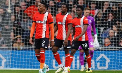 Luton Town's Gabriel Osho (left) stands dejected with team mates after his sides conceded a second goal scored by Brentford's Yoane Wissa (not pictured) during the Premier League match at Kenilworth Road.