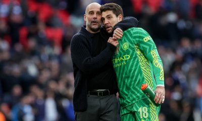 Manchester City's manager Pep Guardiola (L) celebrates with goalkeeper Stefan Ortega after winning the FA Cup semi-final soccer match of Manchester City against Chelsea FC, in London, Britain, 20 April 2024.