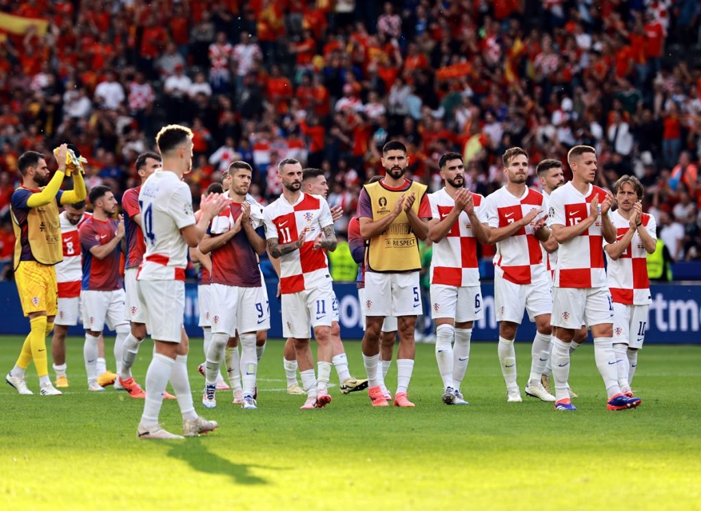 Croatian players applaud to fans after losing the UEFA EURO 2024 group B match between Spain and Croatia in Berlin, Germany, 15 June 2024.