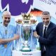 Manchester City manager Pep Guardiola (left) and club chairman Khaldoon Al Mubarak pose for a photo with the Premier League trophy after the Premier League match at the Etihad Stadium, Manchester.