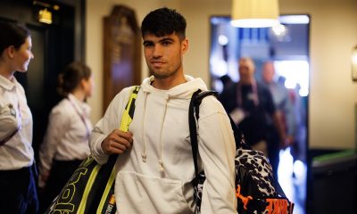 Carlos Alcaraz of Spain arrives for a press conference after losing his second round match at the Queen's Club tennis tournament in London.