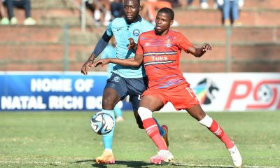Tebogo Mohlmonyane of University of Pretoria challenged by Somila Ntsundwana of Richards Bay during the Dstv Premiership 2023/24 Promotion Playoffs match between Richards Bay FC and Amatuks at King Zwelithini Stadium in Durban on the 5th of June 2024