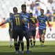 Tshegofatso Nyama and Fidel Brice Ambina of Cape Town City celebrate victory at the final whistle after the DStv Premiership 2023/24 football match between Cape Town Spurs and Cape Town City at Cape Town Stadium on 31 December 2023