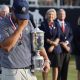 Bryson DeChambeau of the US shows emotions after being presented with the 2024 US Open Championship trophy after winning the golf tournament at Pinehurst No. 2 course.