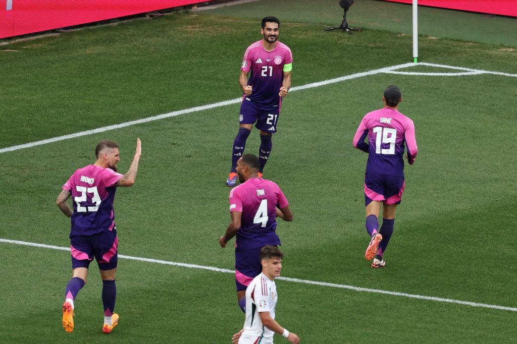 Ilkay Gundogan of Germany (C) celebrates scoring the 2-0 goal with his teammates during the UEFA EURO 2024 Group A soccer match between Germany and Hungary, in Stuttgart.