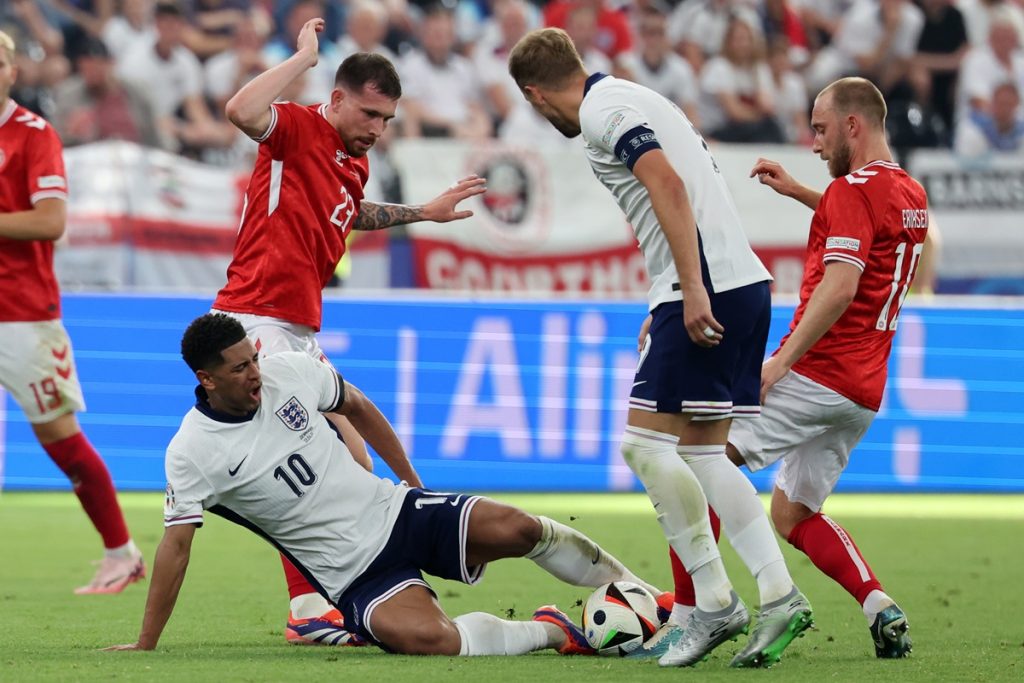 Jude Bellingham of England (C) in action during the UEFA EURO 2024 group C match between Denmark and England, in Frankfurt.