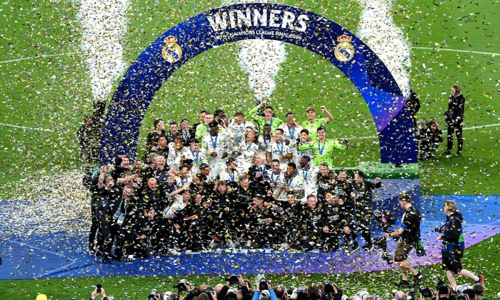 Real Madrid players and staff celebrate after winning the UEFA Champions League final at Wembley Stadium.