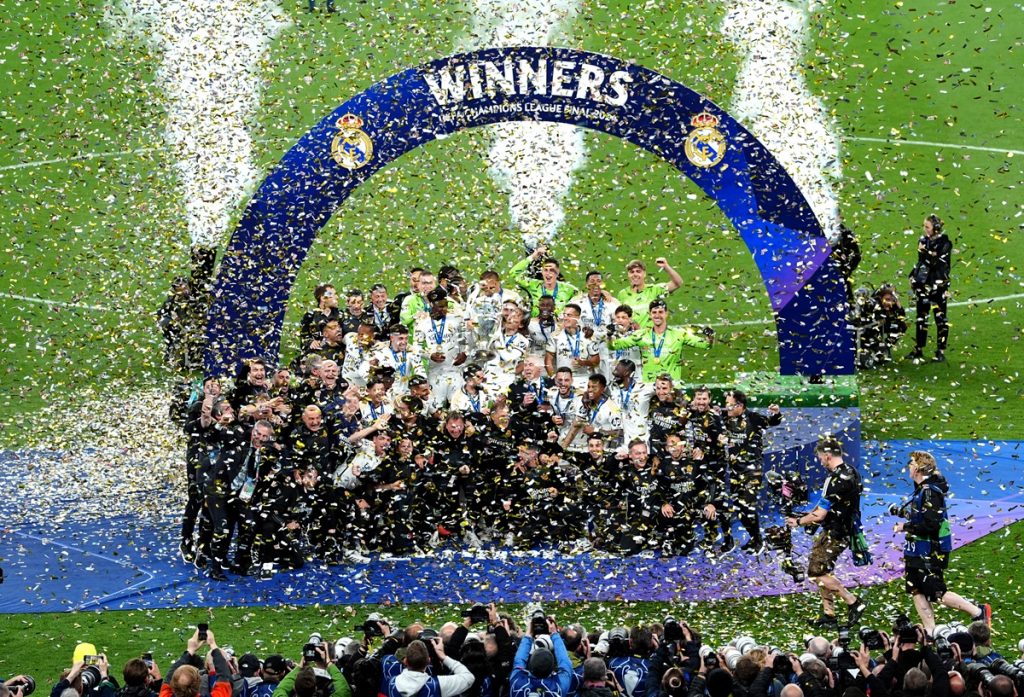 Real Madrid players and staff celebrate after winning the UEFA Champions League final at Wembley Stadium.
