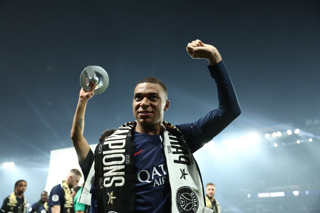 Paris Saint-Germain's French forward Kylian Mbappe celebrates during the French Ligue 1 championship.