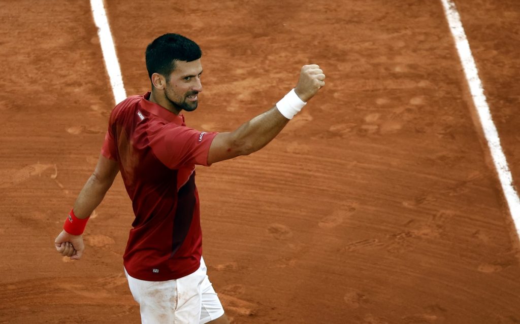Novak Djokovic of Serbia celebrates winning his men's singles Round of 16 match against Francisco Cerundolo of Argentina at the French Open Grand Slam tennis tournament at Roland Garros.