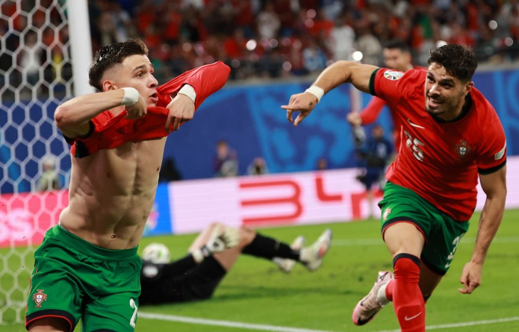 Francisco Conceicao (L) of Portugal celebrates scoring the 2-1 lead during the UEFA EURO 2024 group F match between Portugal and Czech Republic.