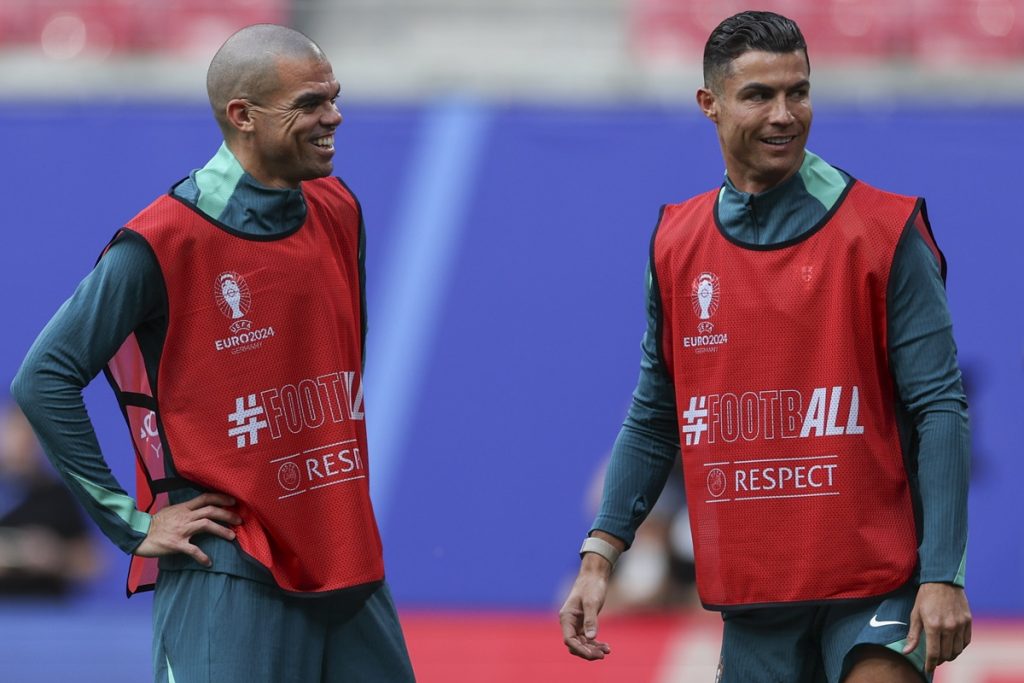Portugal national soccer team players Pepe (L) and Cristiano Ronaldo (R) during a training session in Leipzig.