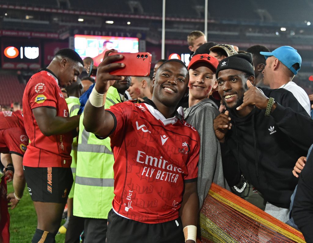 Sanele Nohamba of the Emirates Lions with Emirates Lions fans during the United Rugby Championship 2024 match between Emirate Lions and Cardiff Rugby at Emirates Airline Park Stadium in Johannesburg on the 11th of May 2024