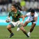 Selvyn Davids of South Africa evades a tackle from Paul Scanlan of Samoa during day three of the 2022 South Africa Rugby World Cup Sevens tournament at Cape Town Stadium on 11 September 2022.