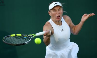 Caroline Wozniacki of Denmark in action during the Women's 1st round match against Alycia Parks of the USA at the Wimbledon Championships.