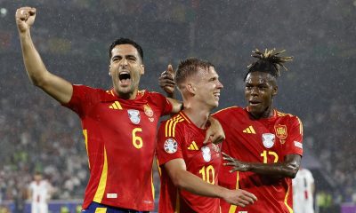 Dani Olmo of Spain (C) celebrates with teammates Mikel Merino (L) and Nico Williams (R) after scoring the 4-1 goal during the UEFA EURO 2024 Round of 16 soccer match between Spain and Georgia, in Cologne.