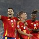 Dani Olmo of Spain (C) celebrates with teammates Mikel Merino (L) and Nico Williams (R) after scoring the 4-1 goal during the UEFA EURO 2024 Round of 16 soccer match between Spain and Georgia, in Cologne.