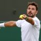 Stan Wawrinka of Switzerland serves during the Men's 1st round match against Charles Broom of Britain at the Wimbledon Championships.