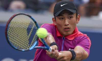 Juncheng Shang of China in action against Casper Ruud of Norway (unseen) during their third round match during the US Open Tennis Championships at the USTA Billie Jean King National Tennis Center in Flushing Meadows.