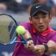 Juncheng Shang of China in action against Casper Ruud of Norway (unseen) during their third round match during the US Open Tennis Championships at the USTA Billie Jean King National Tennis Center in Flushing Meadows.